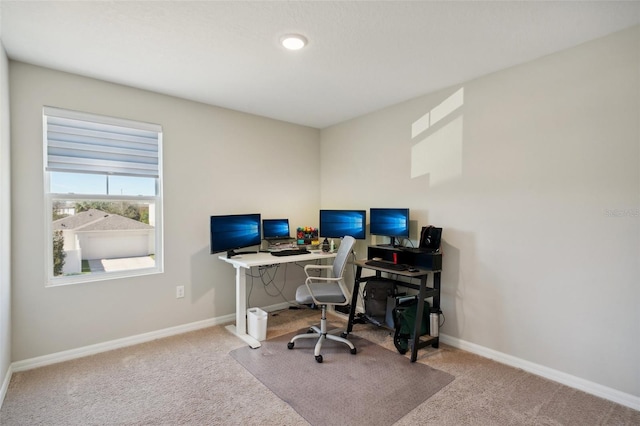 view of carpeted office space