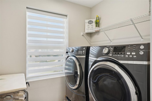 washroom featuring independent washer and dryer and plenty of natural light