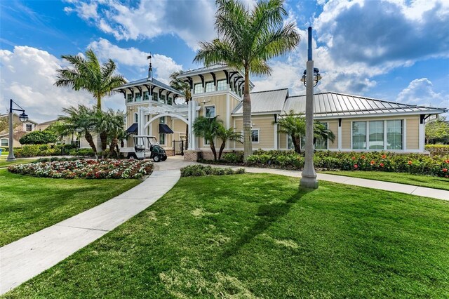 view of front of home featuring a front lawn