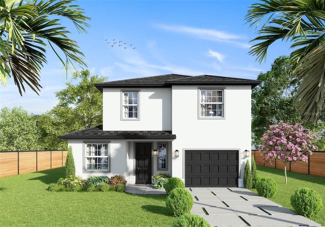 view of front of home featuring a garage and a front lawn