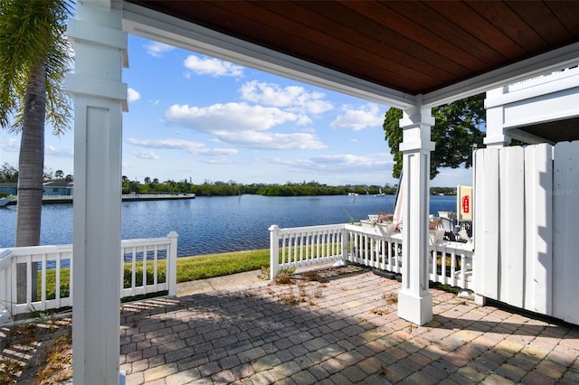 view of patio featuring a water view