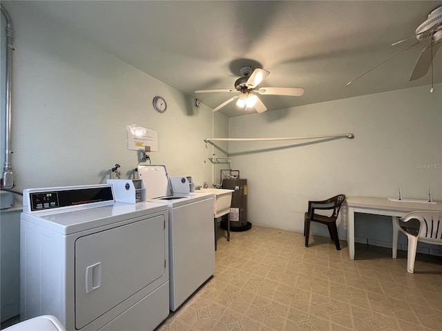 laundry room featuring water heater, sink, separate washer and dryer, and ceiling fan