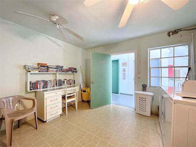 interior space featuring washing machine and dryer and ceiling fan