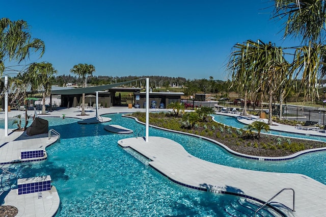 view of swimming pool with a patio