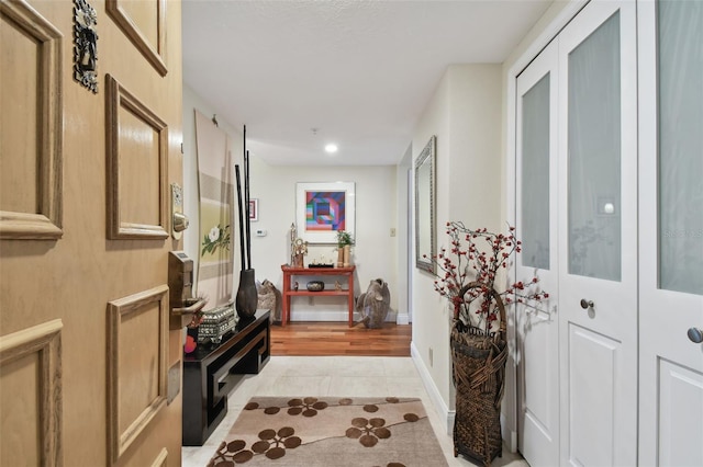 corridor featuring light hardwood / wood-style floors