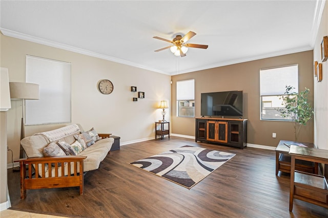 living room with ornamental molding, dark hardwood / wood-style floors, and ceiling fan