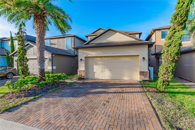 view of front of property featuring a garage