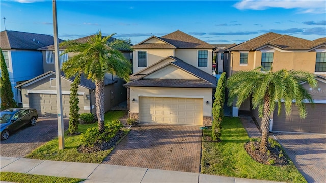 view of front of home with a garage