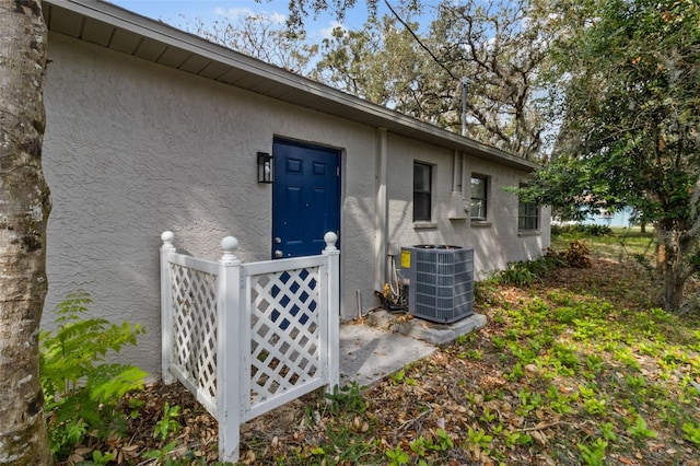 property entrance with cooling unit