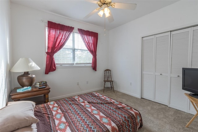 carpeted bedroom with a closet and ceiling fan