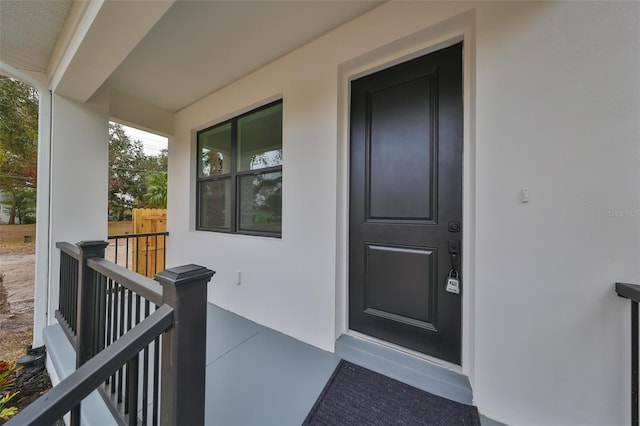 property entrance with a porch