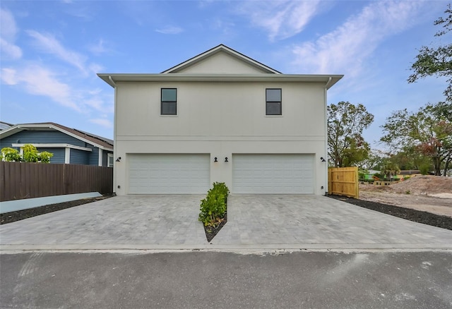 view of front of property featuring a garage