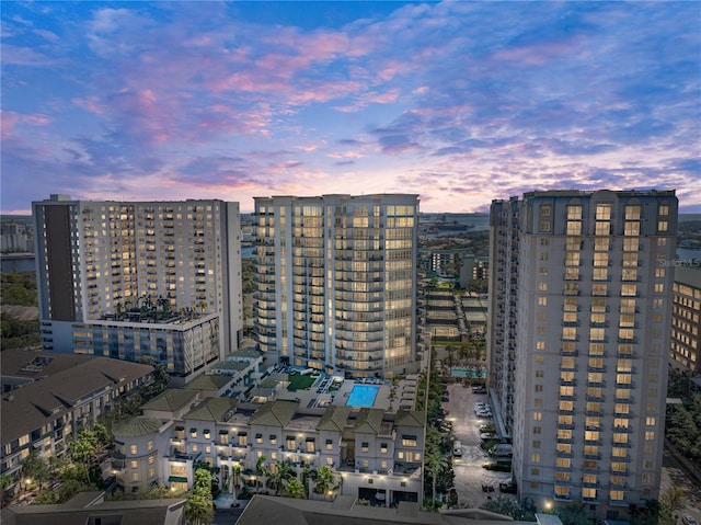 view of outdoor building at dusk