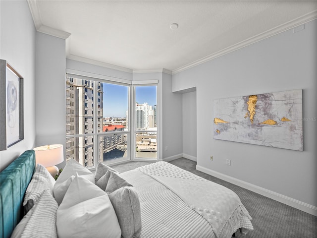 carpeted bedroom featuring baseboards, crown molding, and a city view