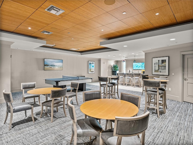 carpeted dining area featuring wood ceiling