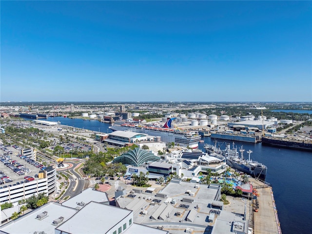 drone / aerial view featuring a water view and a city view