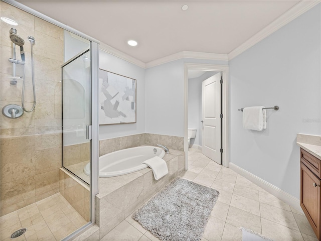 bathroom featuring a garden tub, toilet, vanity, a stall shower, and crown molding