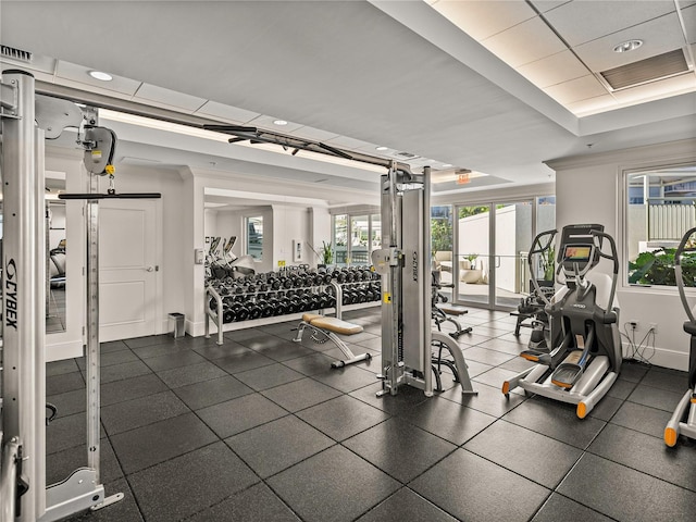 workout area featuring recessed lighting and baseboards