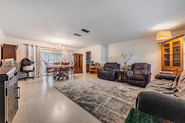 living room with a notable chandelier