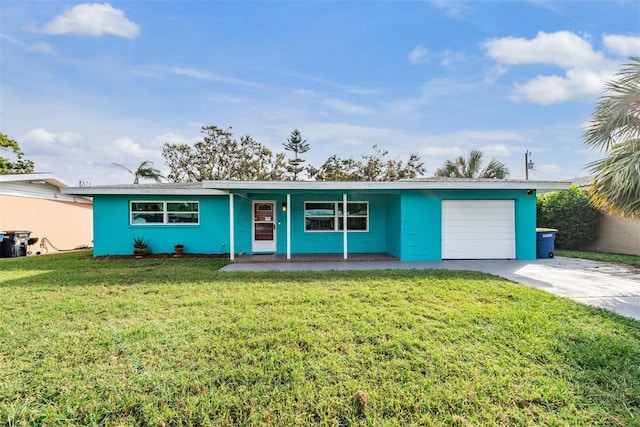 single story home featuring a front lawn, a garage, and covered porch