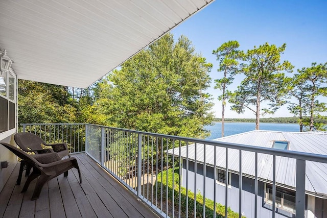 balcony featuring a water view