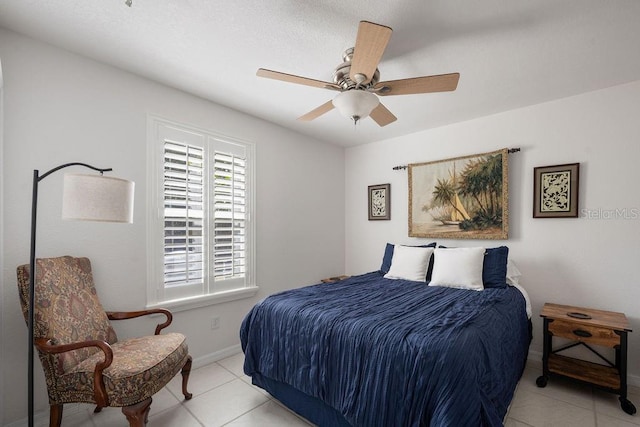 bedroom featuring ceiling fan and light tile patterned floors