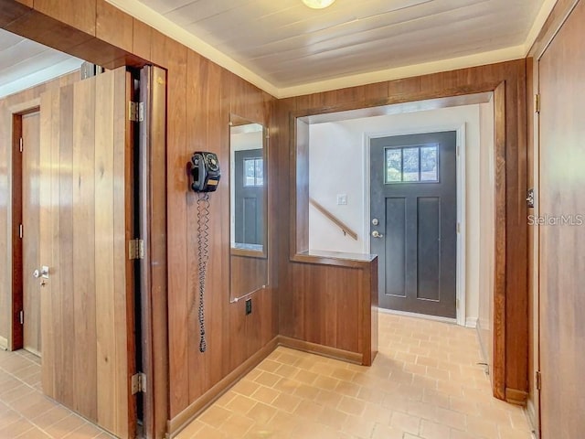 doorway with wooden walls