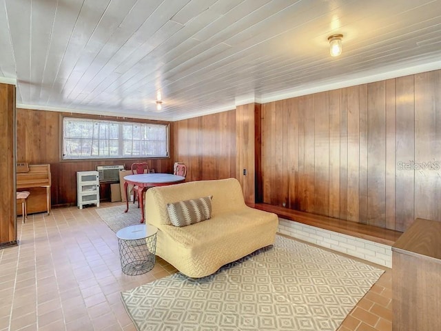 bedroom featuring wood ceiling and wooden walls