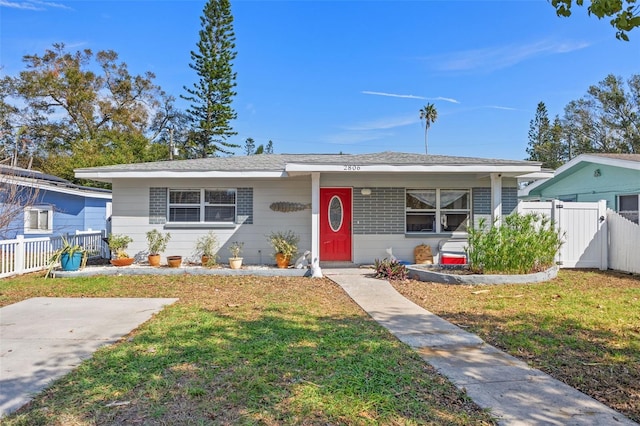 bungalow with a front lawn