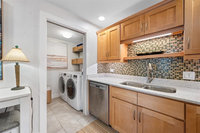 interior space with washer and dryer and sink