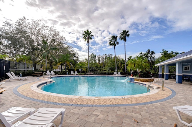 view of pool featuring a patio area