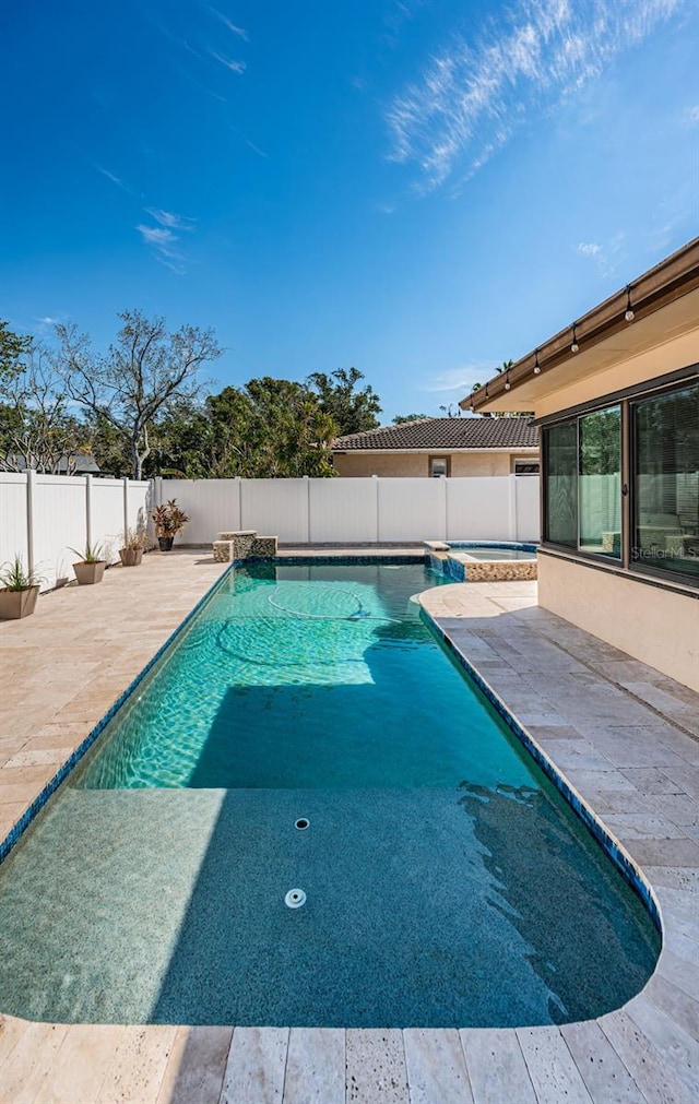 view of pool with a patio