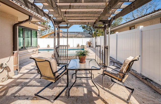 view of patio / terrace featuring a fenced in pool and a pergola