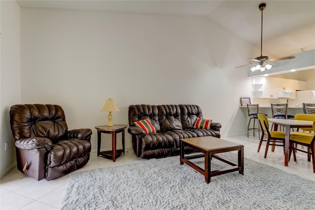 tiled living room with vaulted ceiling and ceiling fan