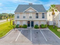 exterior space featuring a front lawn