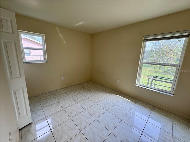 view of tiled empty room