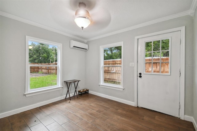 doorway with ornamental molding, plenty of natural light, ceiling fan, and a wall unit AC