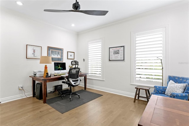 home office with ornamental molding, light hardwood / wood-style flooring, and ceiling fan