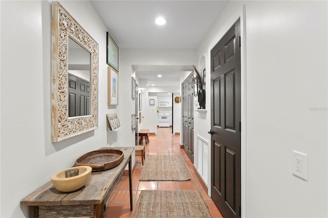 corridor featuring tile patterned floors