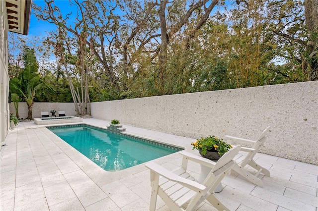 view of swimming pool featuring a patio