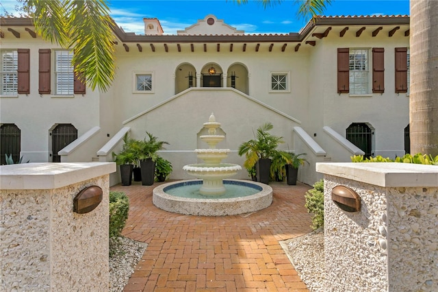 rear view of property with a patio area