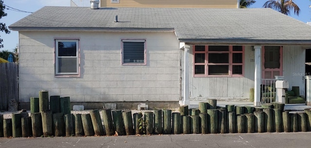 view of property exterior featuring covered porch