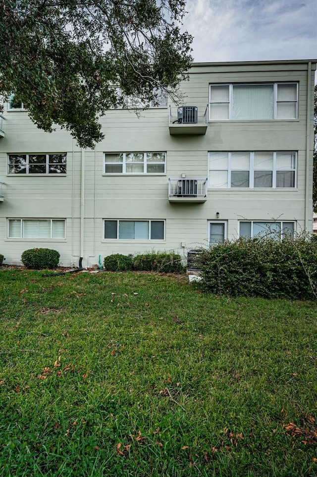 view of property with central air condition unit