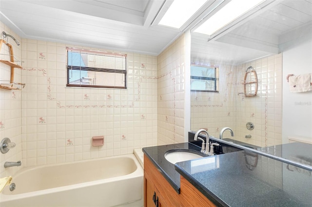 bathroom featuring vanity and a healthy amount of sunlight