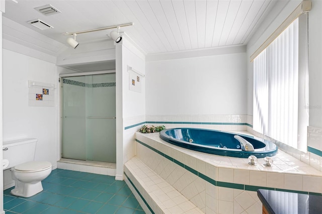 bathroom with plus walk in shower, rail lighting, tile patterned flooring, ornamental molding, and toilet