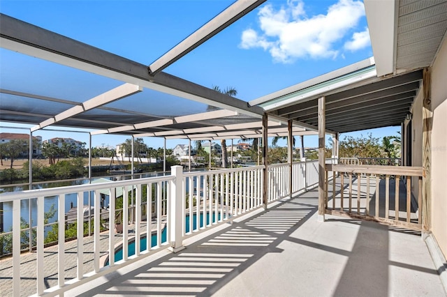 balcony featuring a sunroom and a patio