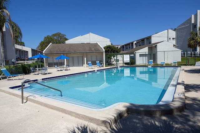 view of pool featuring a patio area