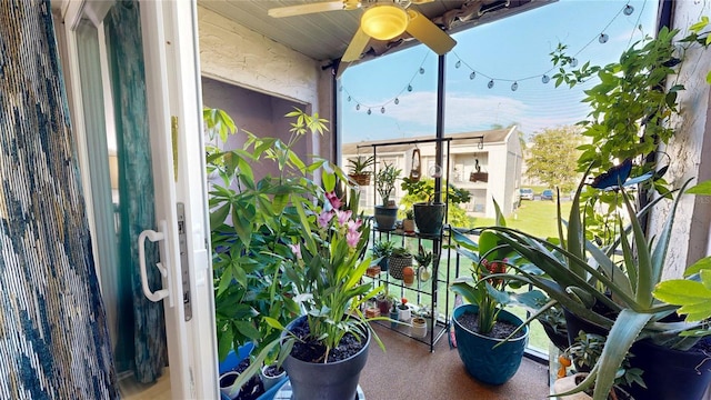 balcony featuring ceiling fan