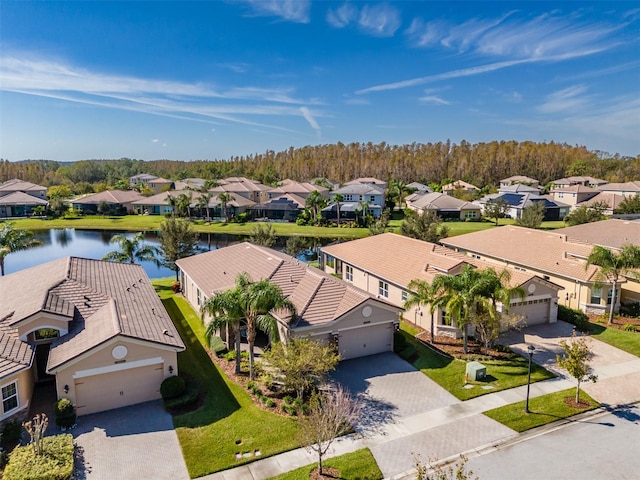 bird's eye view with a water view