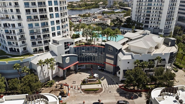 birds eye view of property with a water view